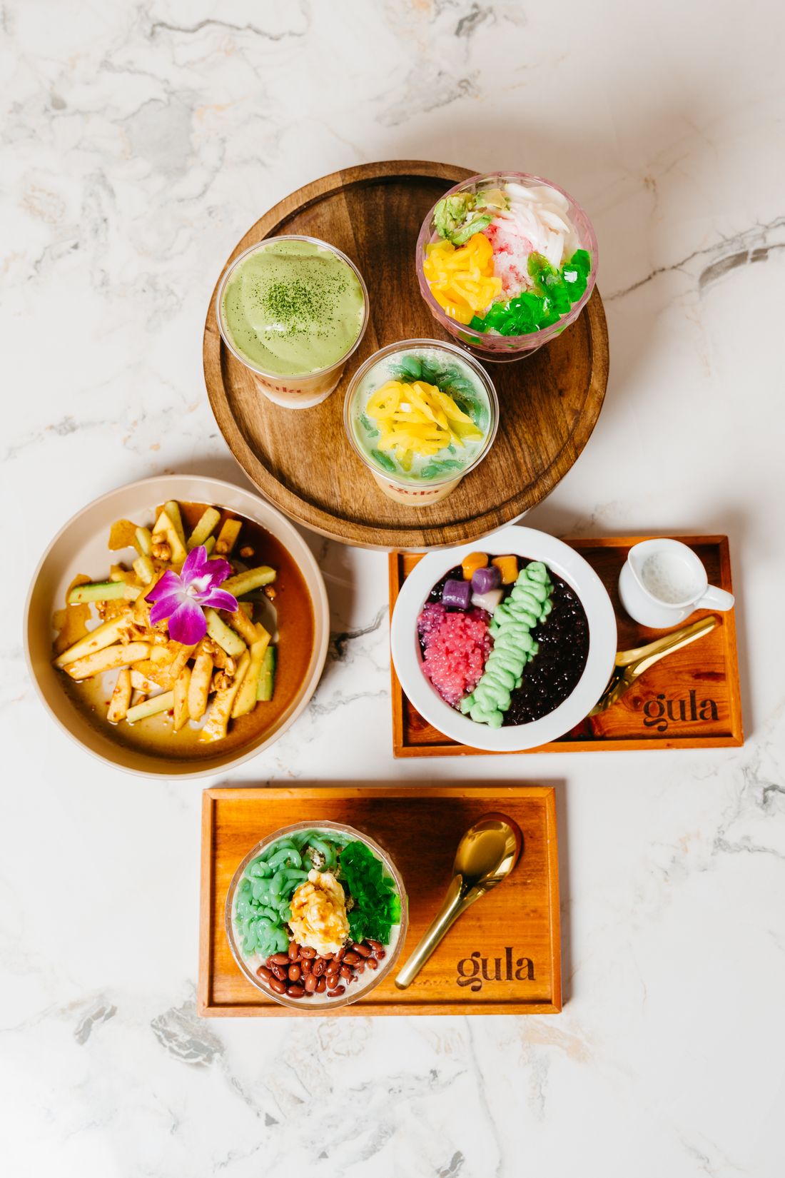A tiered stand of colorful desserts